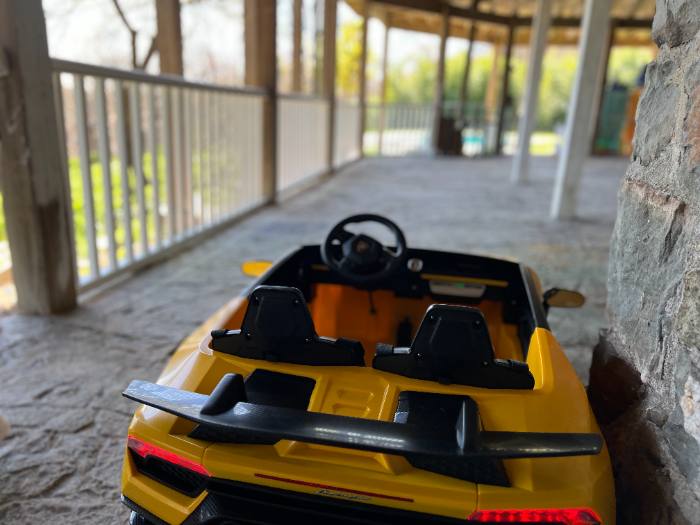 Ride-on car under the covered patio