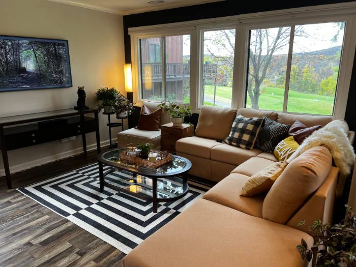 Living room with windows onto the golf course